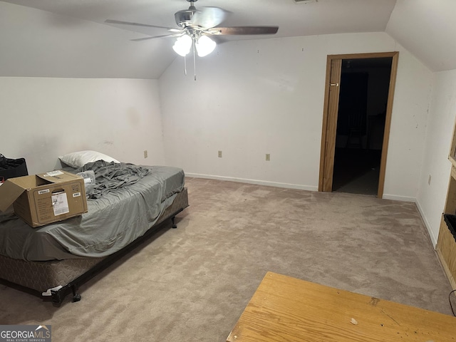 bedroom with baseboards, lofted ceiling, a ceiling fan, and carpet flooring