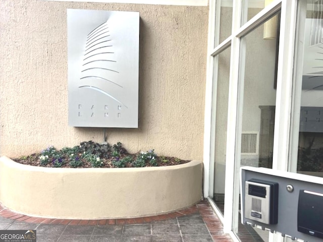 2479 NE Peachtree Rd NE Unit 503, Atlanta, GA 30305 - exterior view of stucco siding