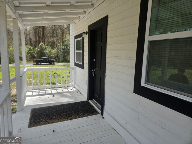 157 Knight St, Irwinton, GA 31042 - view of exterior entry with a porch