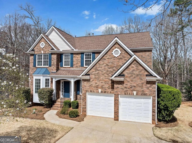 view of front of home with a garage, brick siding, driveway, and a shingled roof