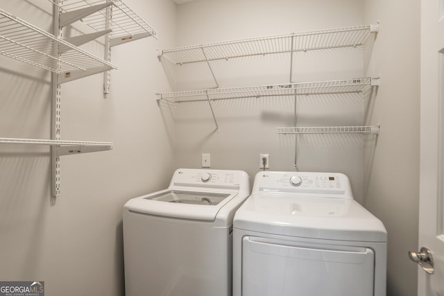1579 Eastern Sunrise Ln, Decatur, GA 30034 - laundry room featuring washer and dryer and laundry area