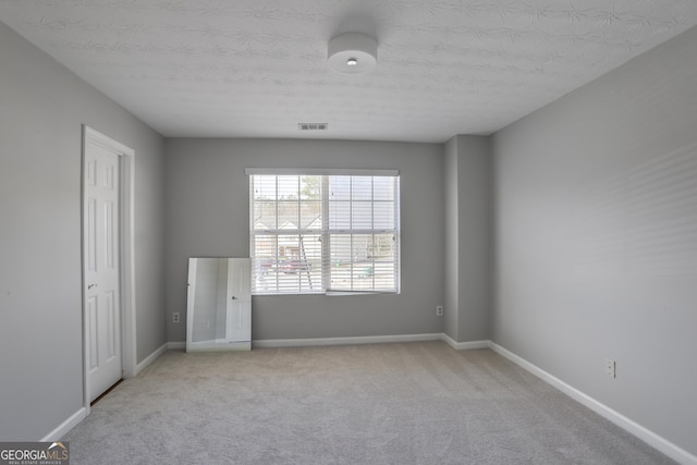 1579 Eastern Sunrise Ln, Decatur, GA 30034 - carpeted spare room featuring visible vents and baseboards