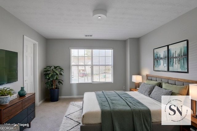 1579 Eastern Sunrise Ln, Decatur, GA 30034 - bedroom featuring baseboards, visible vents, and light carpet