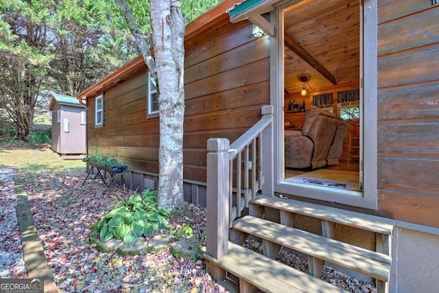 656 River Vista Dr, Dillard, GA 30537 - view of side of home with a storage shed