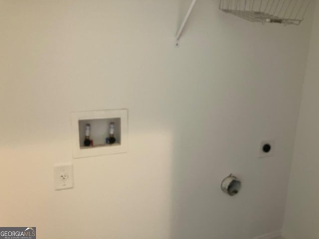 5099 Noble Village Way, Lilburn, GA 30047 - washroom with washer hookup, baseboards, and hookup for an electric dryer