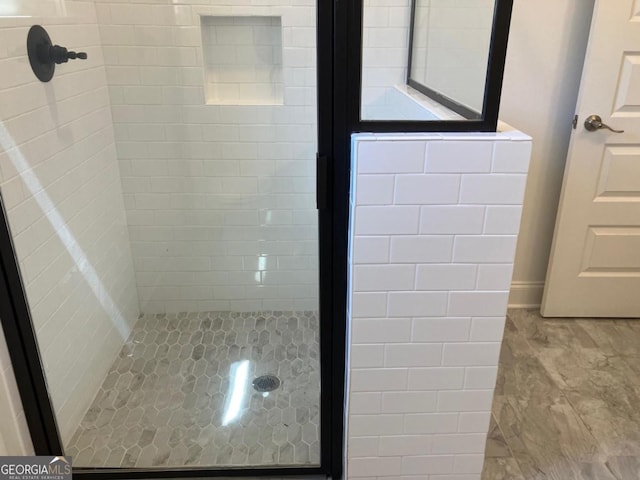 5099 Noble Village Way, Lilburn, GA 30047 - bathroom with a shower stall