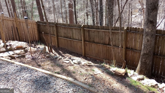 view of yard featuring a fenced backyard