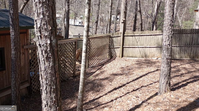 view of yard with a fenced backyard