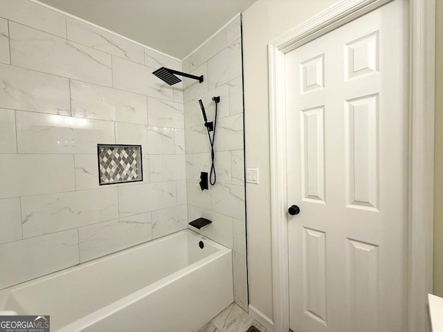 full bath with tub / shower combination and marble finish floor