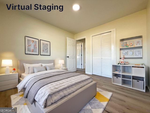 bedroom featuring a closet and wood finished floors