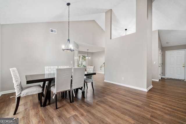 455 Ellesmere Way, Buford, GA 30518 - dining room featuring baseboards, visible vents, a chandelier, and wood finished floors
