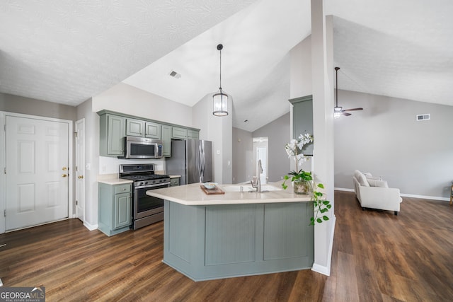 455 Ellesmere Way, Buford, GA 30518 - kitchen with light countertops, a peninsula, stainless steel appliances, and visible vents
