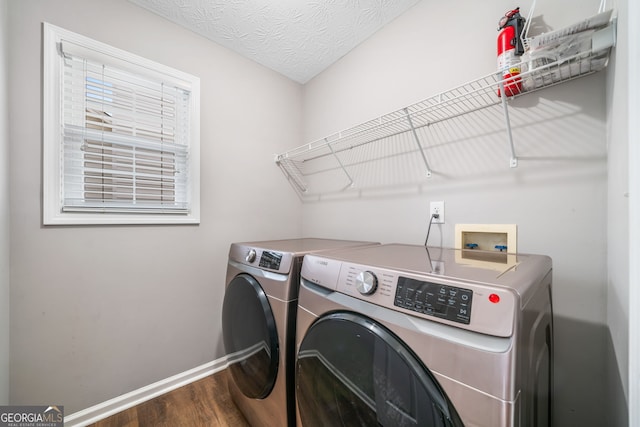 455 Ellesmere Way, Buford, GA 30518 - clothes washing area with dark wood finished floors, baseboards, washing machine and clothes dryer, and laundry area