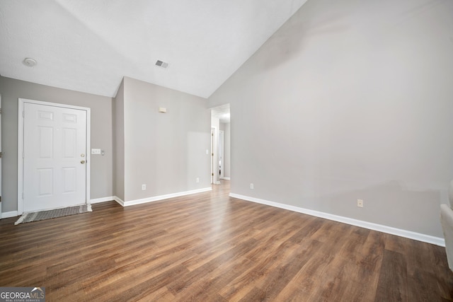 455 Ellesmere Way, Buford, GA 30518 - unfurnished living room featuring baseboards, high vaulted ceiling, and wood finished floors
