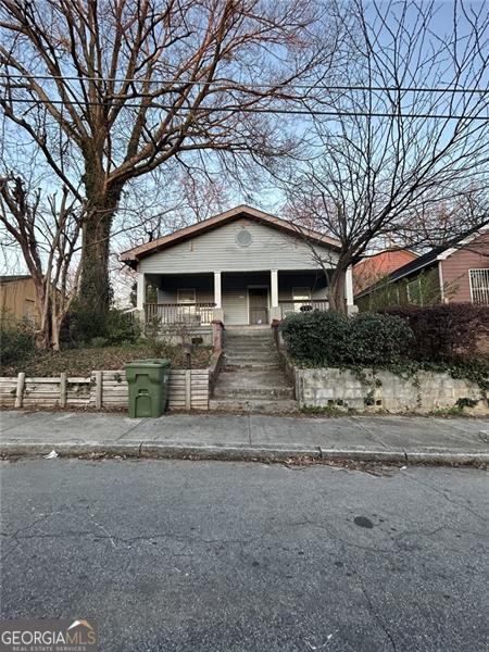bungalow-style home with covered porch