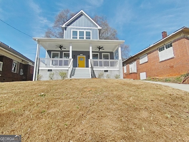 721 Cascade Ave SW, Atlanta, GA 30310 - view of front of home with a ceiling fan, board and batten siding, a porch, and a front lawn