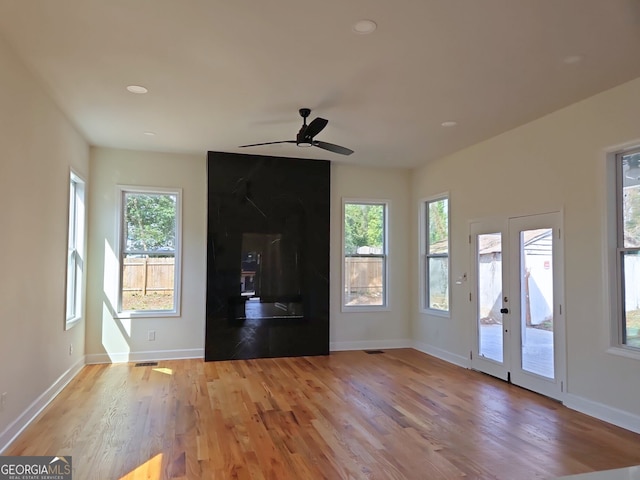 721 Cascade Ave SW, Atlanta, GA 30310 - unfurnished living room featuring light wood finished floors, a ceiling fan, and recessed lighting
