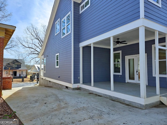 721 Cascade Ave SW, Atlanta, GA 30310 - view of property exterior featuring french doors, crawl space, and a ceiling fan