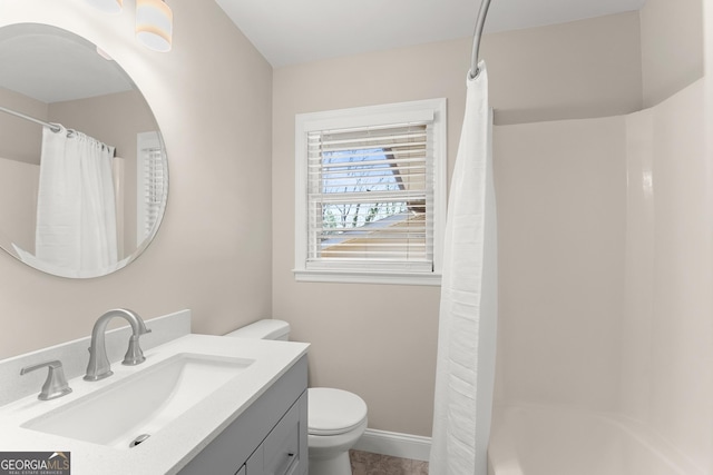 full bath with vanity, shower / bathtub combination with curtain, and toilet