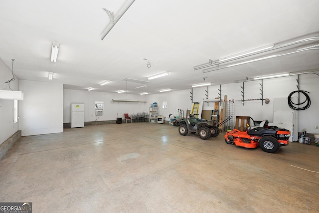 garage featuring freestanding refrigerator