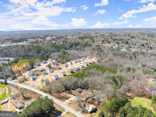 aerial view with a view of trees and a residential view