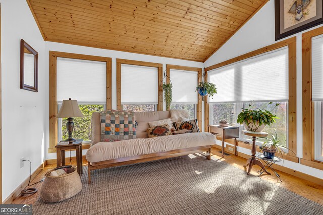 181 Yonah Lake Cir, Toccoa, GA 30577 - sunroom with lofted ceiling, healthy amount of natural light, wood finished floors, baseboards, and wooden ceiling