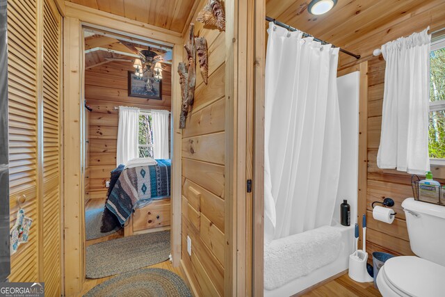 181 Yonah Lake Cir, Toccoa, GA 30577 - full bath with toilet, wood ceiling, wooden walls, wood finished floors, and shower / bath combo