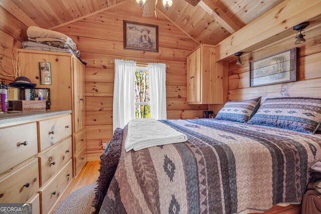 181 Yonah Lake Cir, Toccoa, GA 30577 - bedroom with light wood finished floors, wooden ceiling, and wood walls