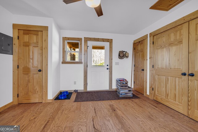 181 Yonah Lake Cir, Toccoa, GA 30577 - entrance foyer featuring electric panel, wood finished floors, baseboards, and a ceiling fan