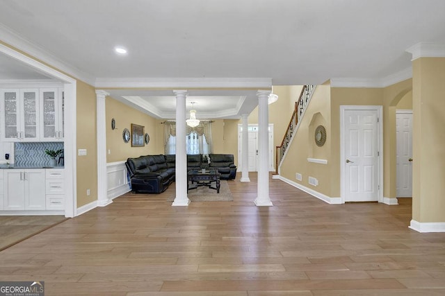 1621 Telfair Chase Way, Lawrenceville, GA 30043 - entryway featuring light wood-style floors, crown molding, and ornate columns