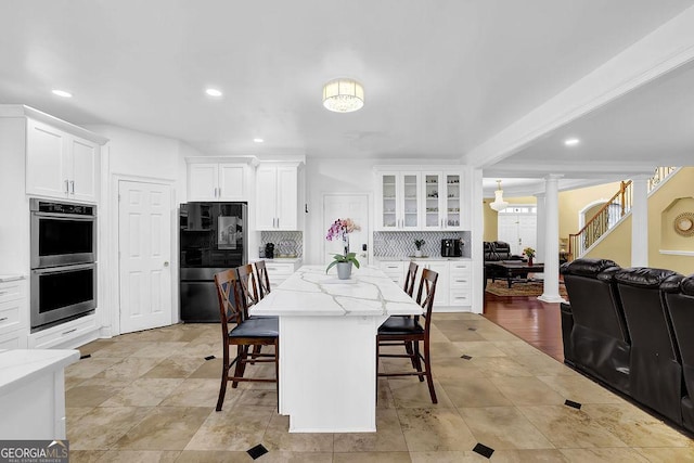 1621 Telfair Chase Way, Lawrenceville, GA 30043 - dining area featuring decorative columns, light tile patterned floors, and recessed lighting