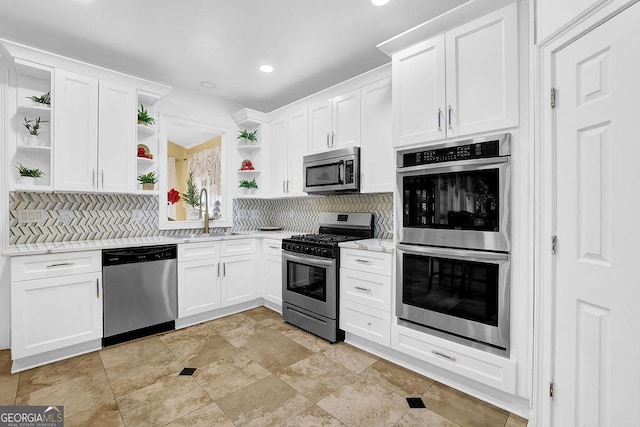 1621 Telfair Chase Way, Lawrenceville, GA 30043 - kitchen featuring stainless steel appliances, white cabinets, a sink, and open shelves
