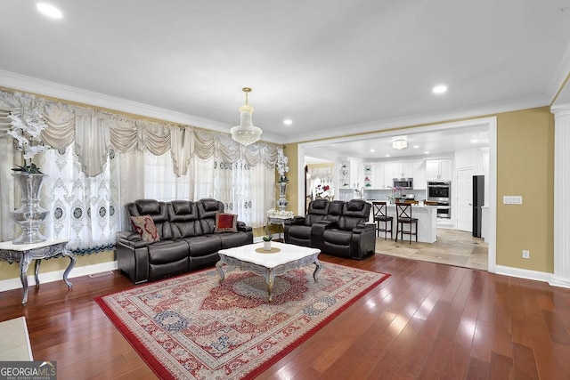 1621 Telfair Chase Way, Lawrenceville, GA 30043 - living room with ornamental molding, baseboards, recessed lighting, and wood-type flooring