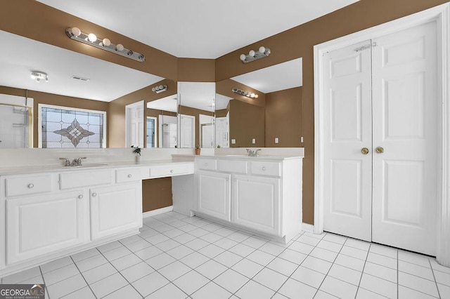 1621 Telfair Chase Way, Lawrenceville, GA 30043 - bathroom with vanity, baseboards, tile patterned flooring, and visible vents