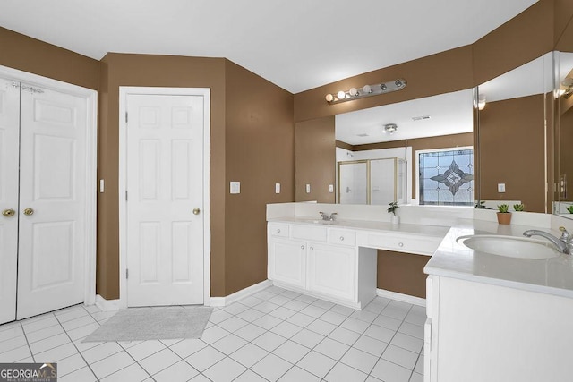 1621 Telfair Chase Way, Lawrenceville, GA 30043 - full bathroom with a sink, two vanities, a shower stall, and tile patterned flooring