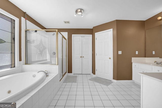 1621 Telfair Chase Way, Lawrenceville, GA 30043 - full bathroom featuring visible vents, baseboards, a whirlpool tub, a shower stall, and vanity
