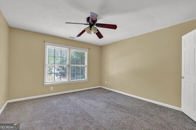 1621 Telfair Chase Way, Lawrenceville, GA 30043 - spare room with carpet floors, visible vents, baseboards, and ceiling fan