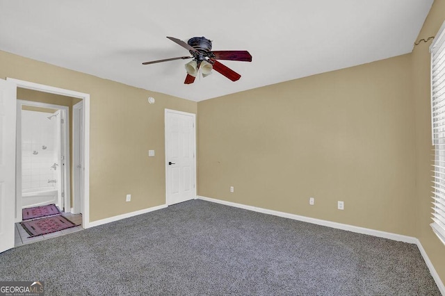 1621 Telfair Chase Way, Lawrenceville, GA 30043 - unfurnished bedroom featuring ensuite bathroom, baseboards, a ceiling fan, and carpet flooring