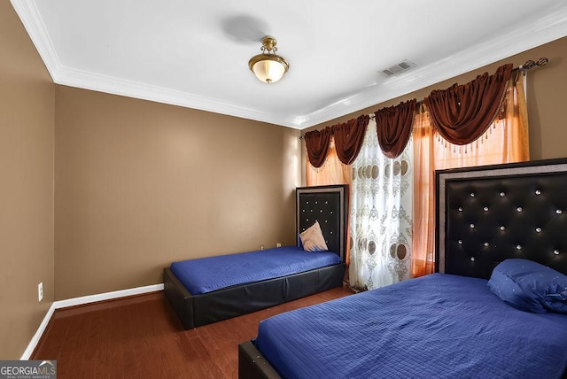 1621 Telfair Chase Way, Lawrenceville, GA 30043 - bedroom featuring crown molding, wood finished floors, baseboards, and visible vents