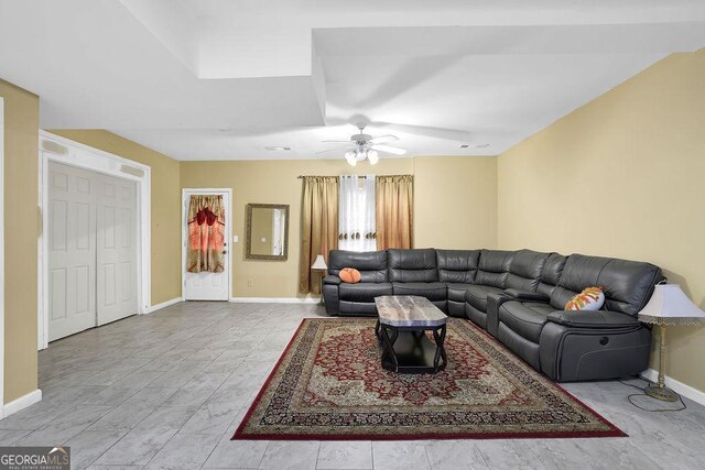 1621 Telfair Chase Way, Lawrenceville, GA 30043 - living room with visible vents, baseboards, and a ceiling fan