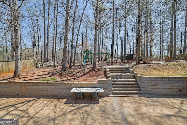 1621 Telfair Chase Way, Lawrenceville, GA 30043 - view of patio / terrace with playground community
