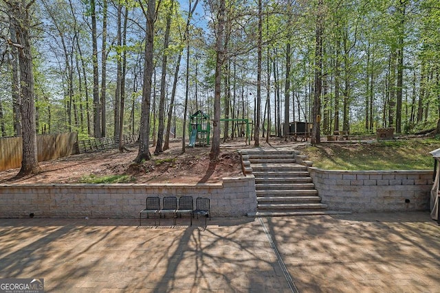 1621 Telfair Chase Way, Lawrenceville, GA 30043 - wooden terrace with a patio and fence