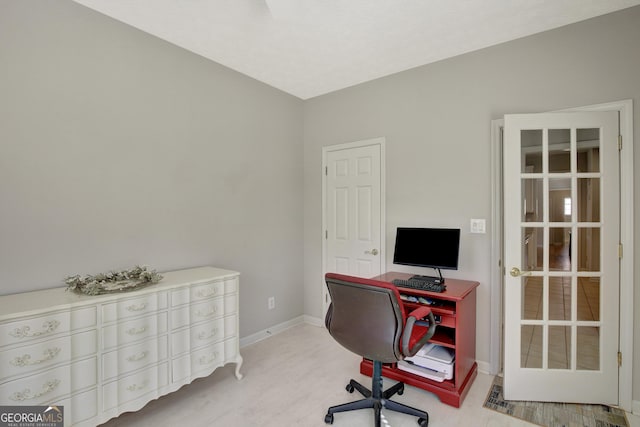 office space featuring baseboards