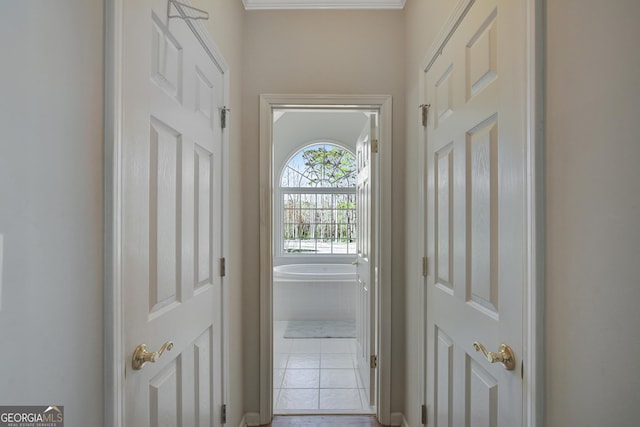 doorway featuring tile patterned flooring