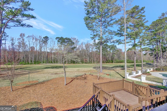 view of yard featuring a wooded view