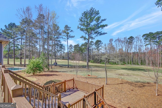 view of yard with a wooden deck