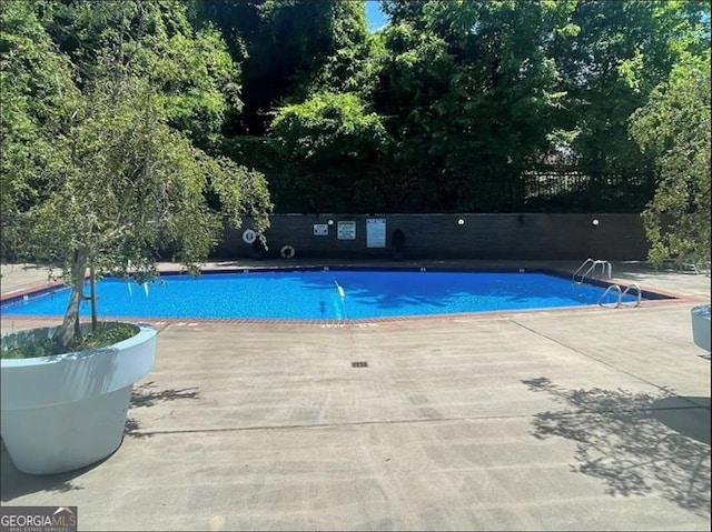 215 Piedmont Ave NE Unit 2205, Atlanta, GA 30308 - community pool featuring fence and a patio