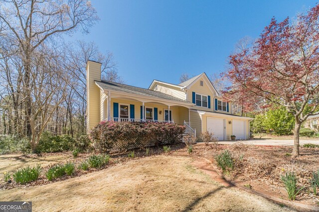 45 Somerset Ct, Covington, GA 30016 - traditional-style home with driveway and a garage