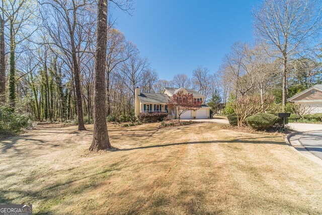 45 Somerset Ct, Covington, GA 30016 - view of front of property featuring driveway and an attached garage