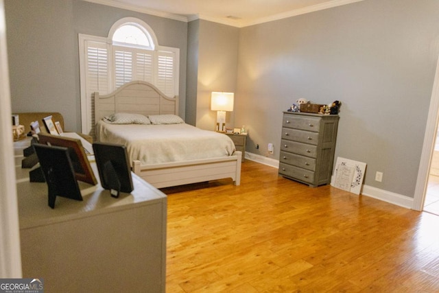 430 Brantley Rdg, Warner Robins, GA 31088 - bedroom featuring crown molding and light wood finished floors